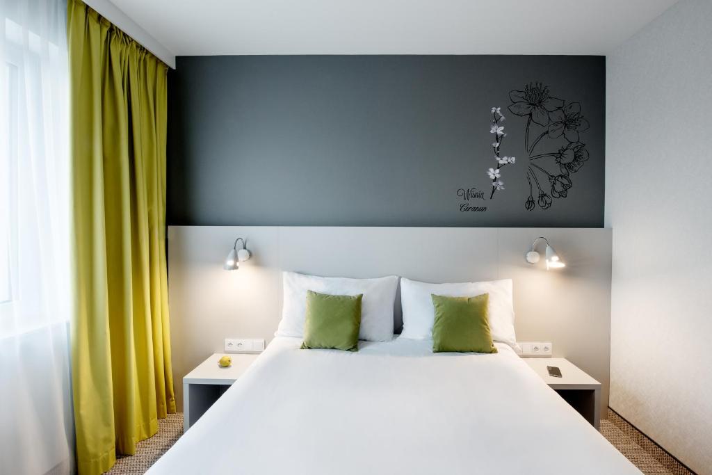 Posteľ alebo postele v izbe v ubytovaní ibis Styles Siedlce