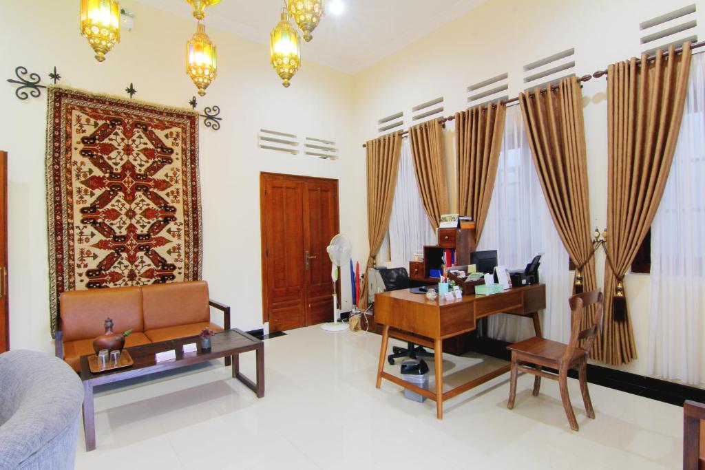 Posezení v ubytování Musafir Guest House Syariah