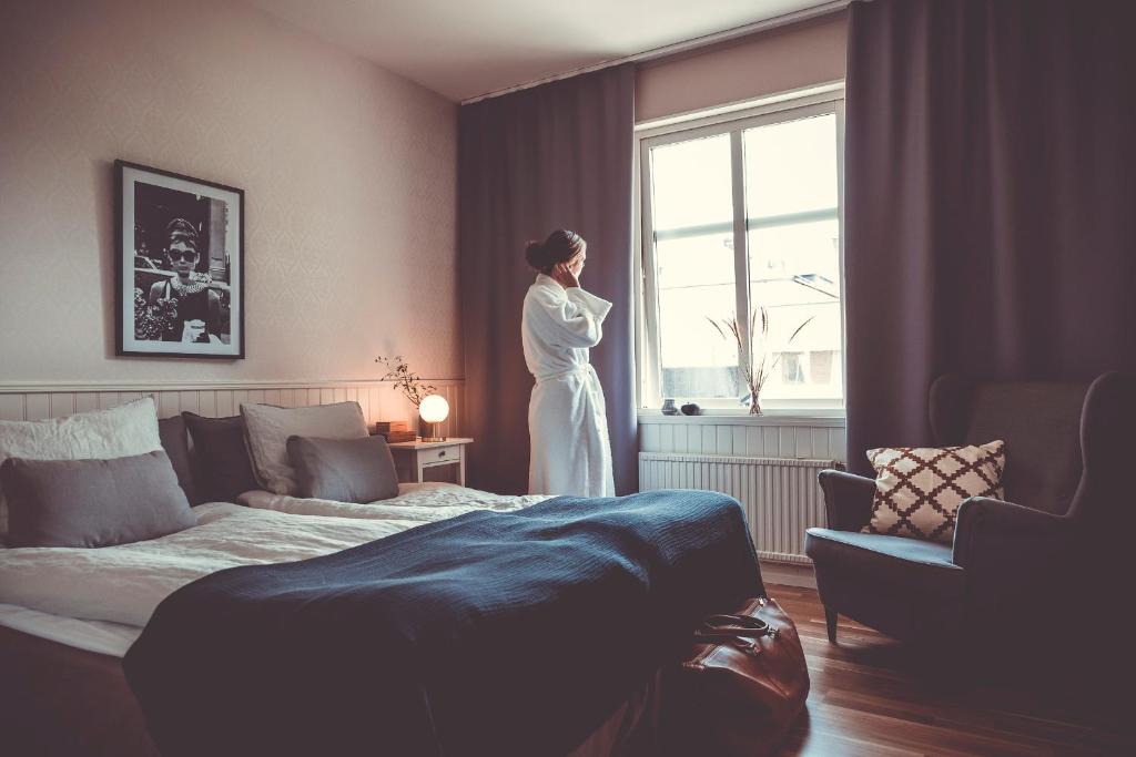 Postel nebo postele na pokoji v ubytování Tyringe Kurhotell
