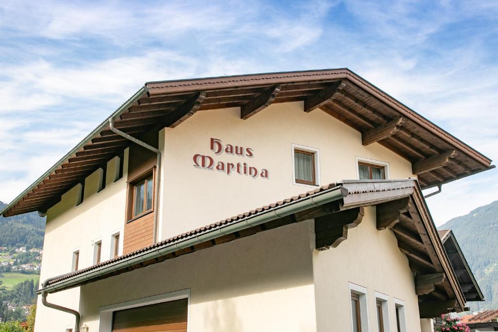 a building with a sign that reads bills paprika at Appartmenthaus Martina in Zell am Ziller