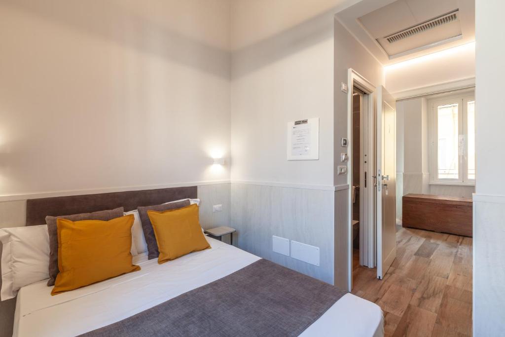 Postel nebo postele na pokoji v ubytování Residenza Cavallini