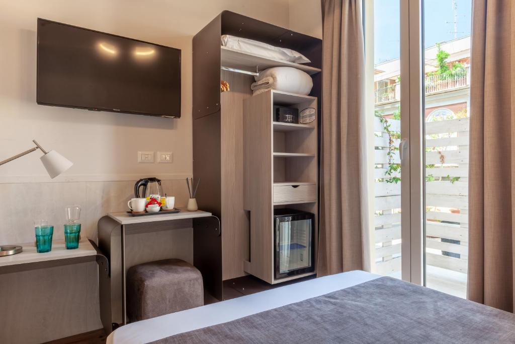 Postel nebo postele na pokoji v ubytování Residenza Cavallini