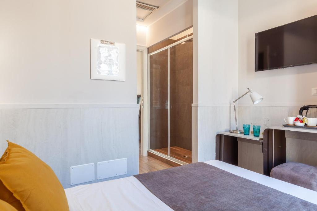 Postel nebo postele na pokoji v ubytování Residenza Cavallini