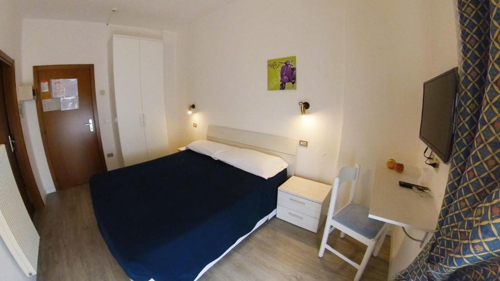 Postel nebo postele na pokoji v ubytování Hotel Alberello