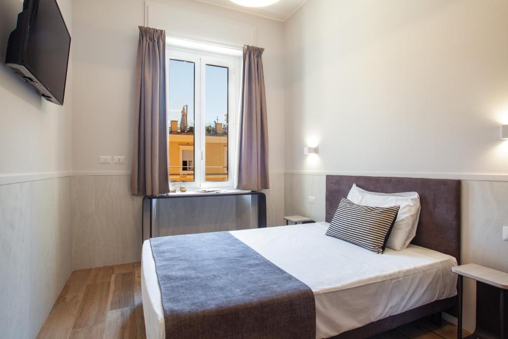 Postel nebo postele na pokoji v ubytování Residenza Cavallini