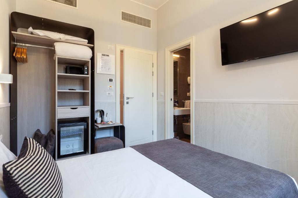Postel nebo postele na pokoji v ubytování Residenza Cavallini