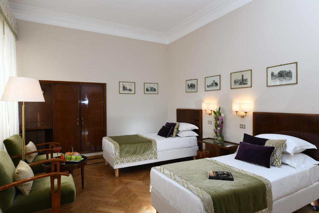 Postel nebo postele na pokoji v ubytování Bettoja Hotel Atlantico
