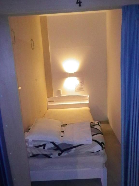 Postel nebo postele na pokoji v ubytování Guest House Proof Point