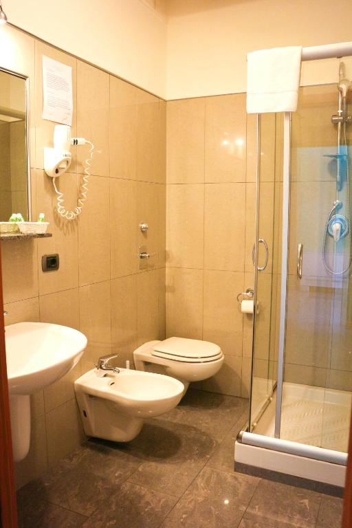 Łazienka w obiekcie Hotel Losanna