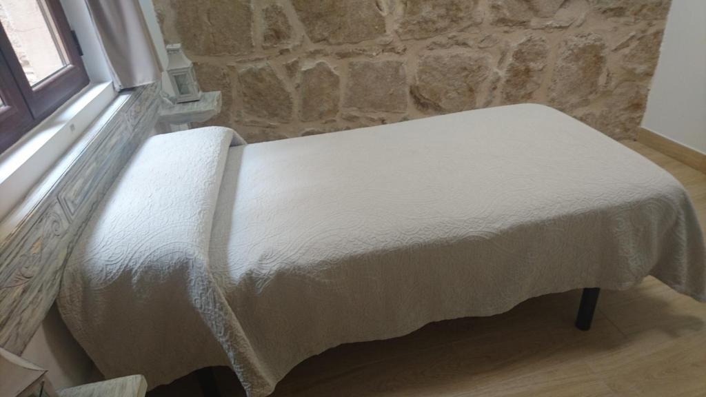 Postel nebo postele na pokoji v ubytování Almena de San Segundo