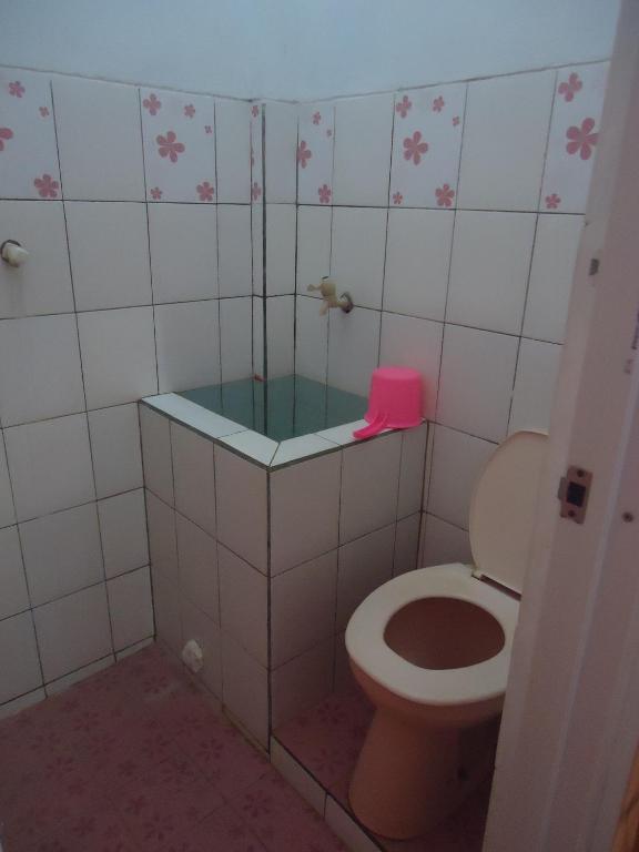 Koupelna v ubytování Kancil homestay