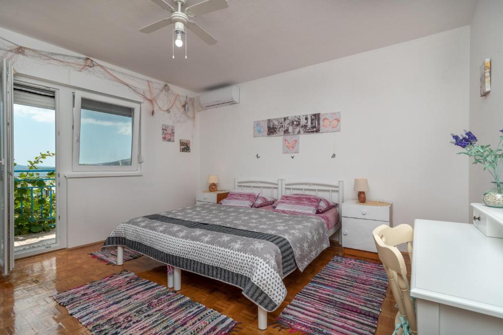 Posteľ alebo postele v izbe v ubytovaní Apartment Radja