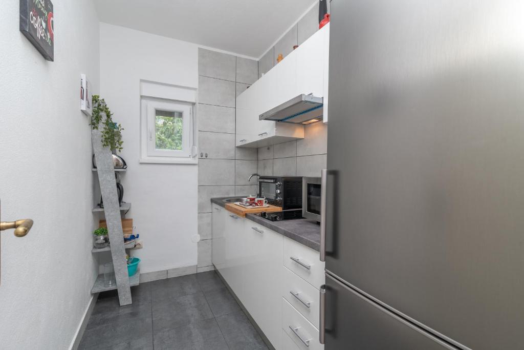 Kuchyňa alebo kuchynka v ubytovaní Apartment Radja