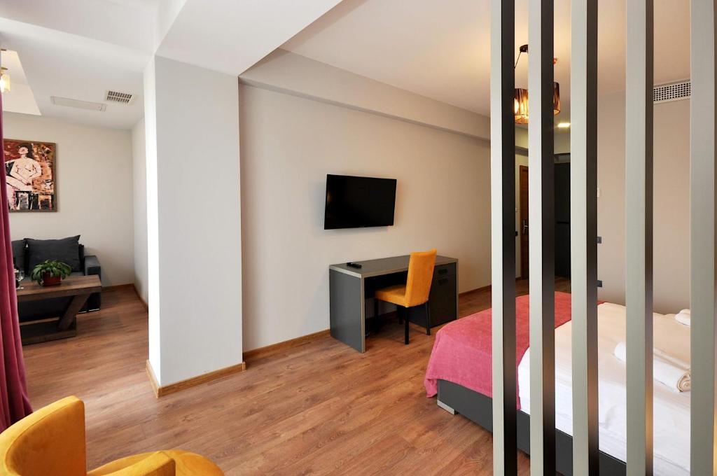 Postel nebo postele na pokoji v ubytování Jazz Hotel