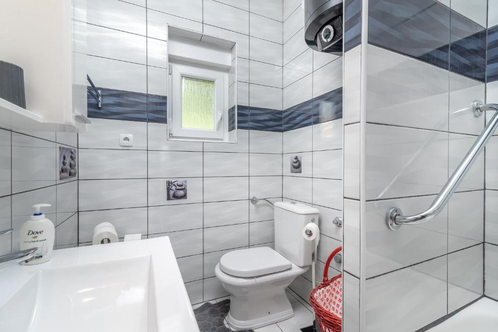 Kúpeľňa v ubytovaní Apartment Radja