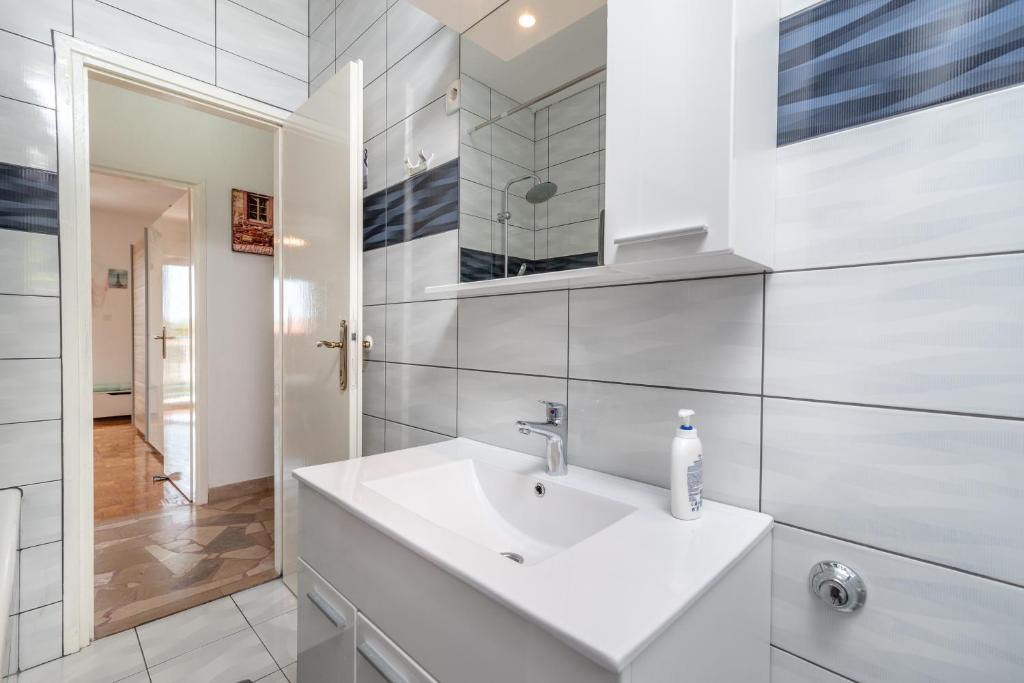 Kúpeľňa v ubytovaní Apartment Radja
