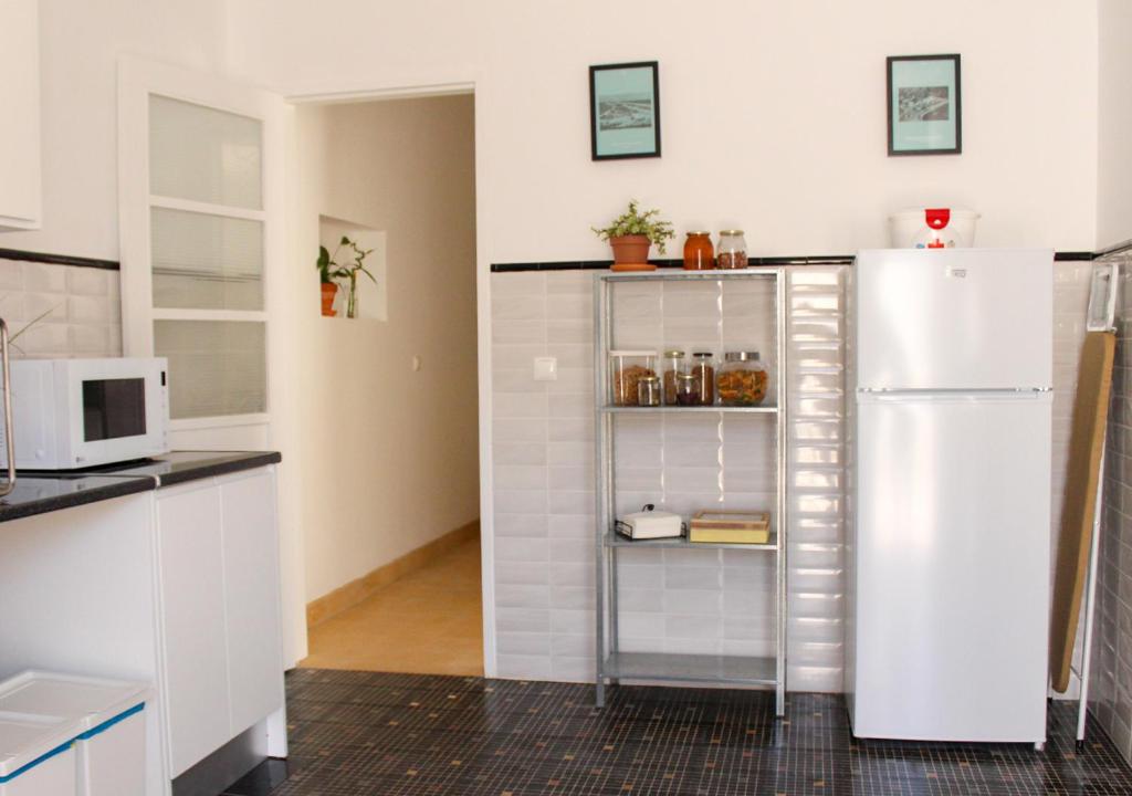Kuchyň nebo kuchyňský kout v ubytování Greenth Avenue