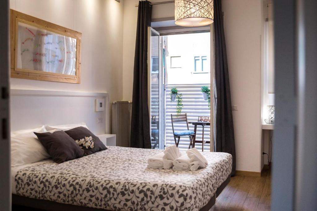 Posteľ alebo postele v izbe v ubytovaní Dulcis In Vatican b&b