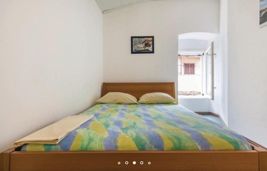 Łóżko lub łóżka w pokoju w obiekcie House Hermes