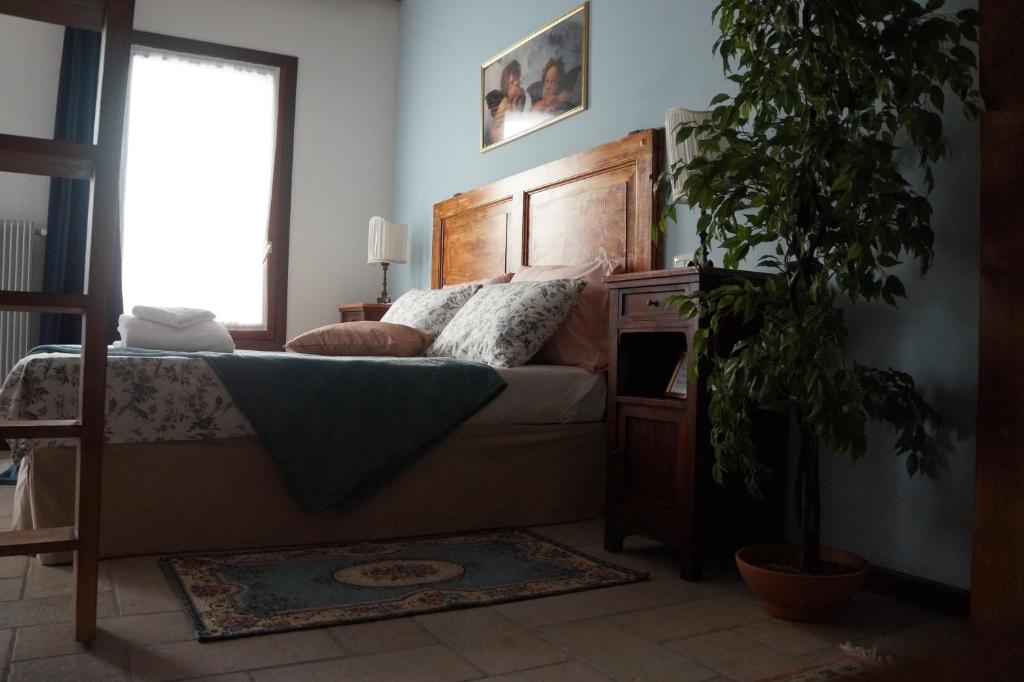 Łóżko lub łóżka w pokoju w obiekcie LA BRIGATA APARTMENTS Suite Room