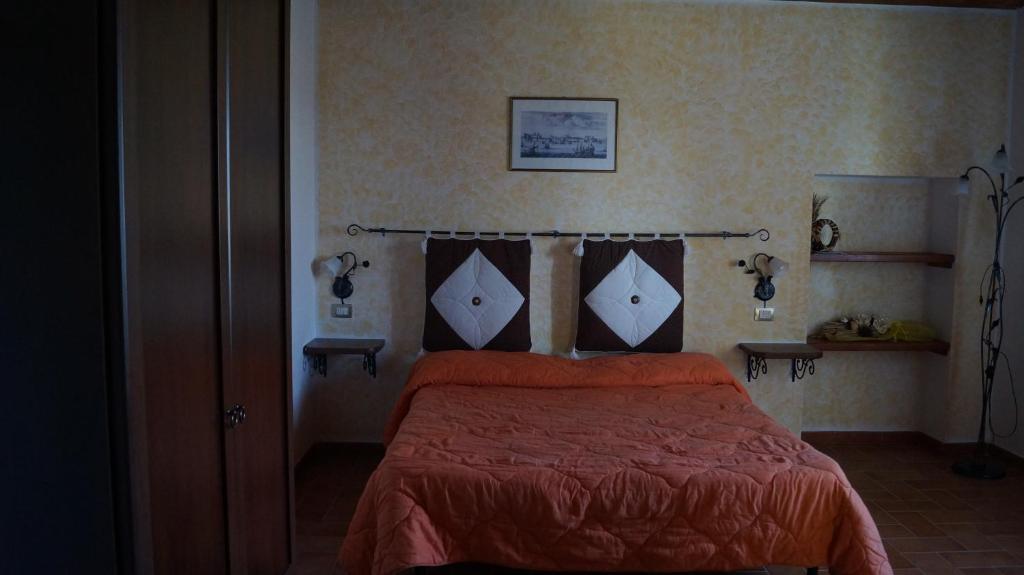 Posteľ alebo postele v izbe v ubytovaní Agriturismo Poggio San Pietro