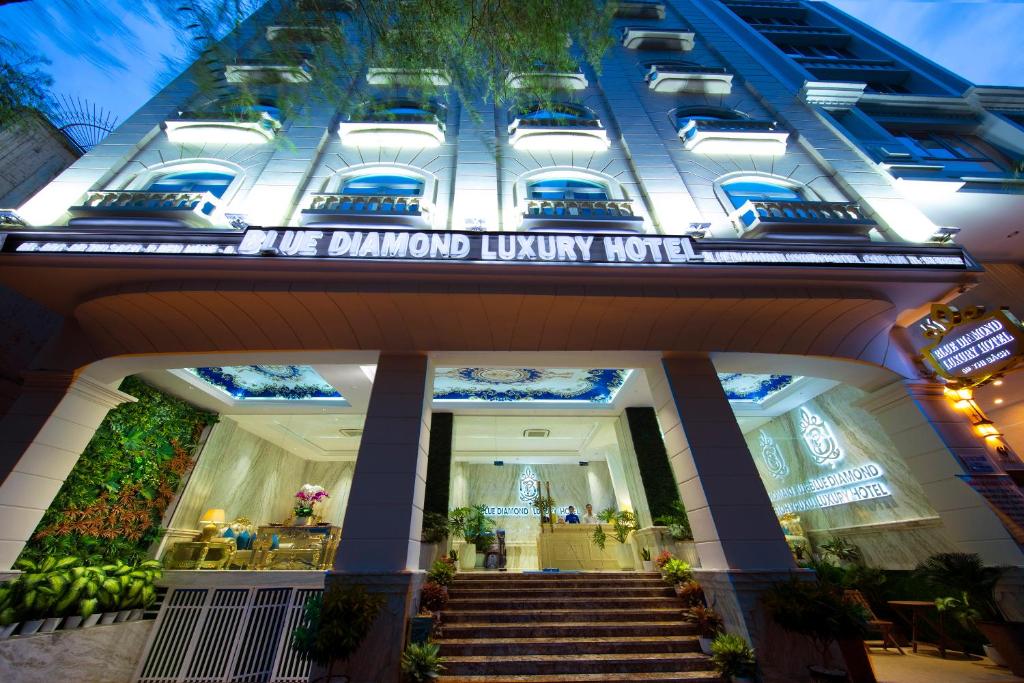 a view of the diamond luxury hotel at night at Blue Diamond Luxury Hotel in Ho Chi Minh City