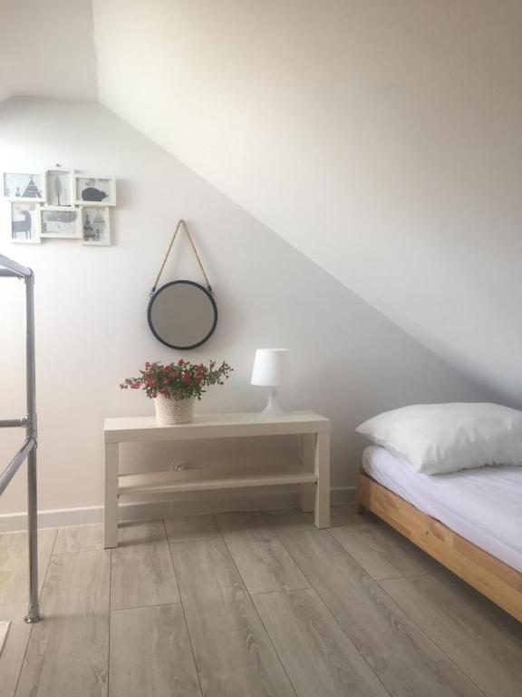 Postel nebo postele na pokoji v ubytování Apartament Julia