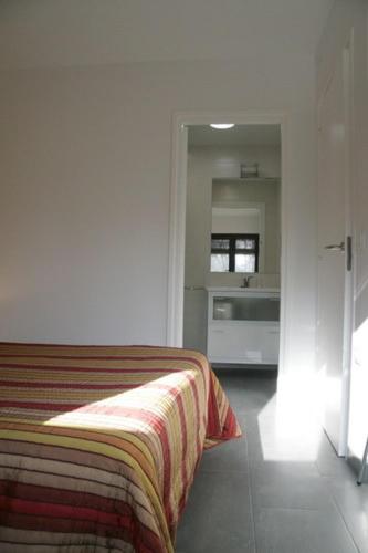 Postel nebo postele na pokoji v ubytování Carmelita