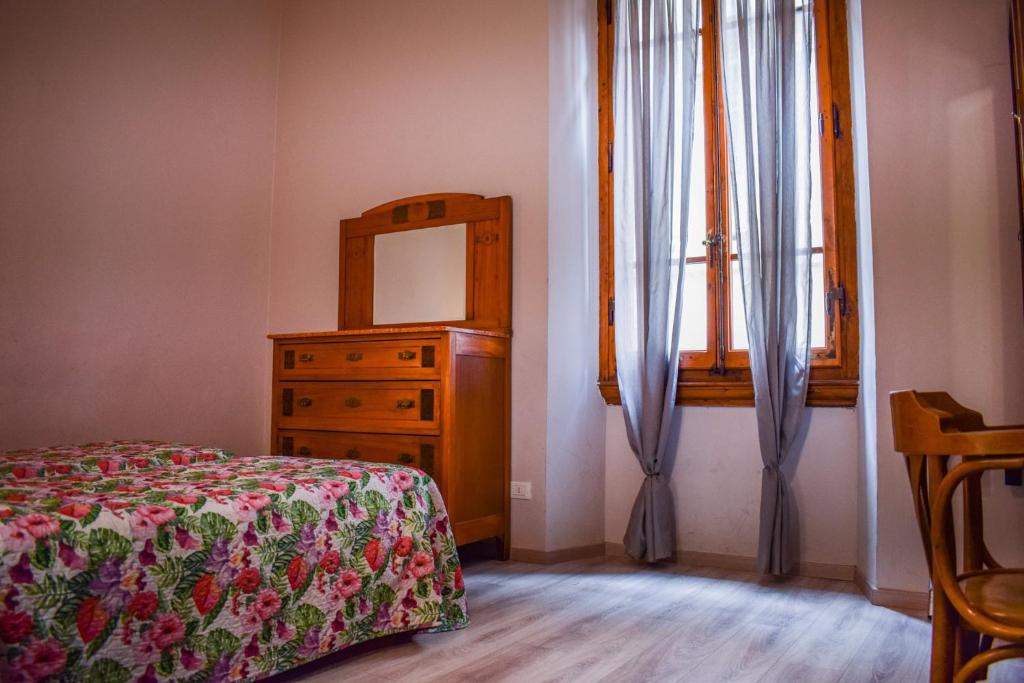 A bed or beds in a room at Hotel Medici