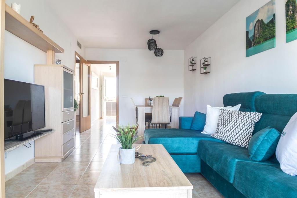 Televízia a/alebo spoločenská miestnosť v ubytovaní Homes&Go Nova Pineda Alto