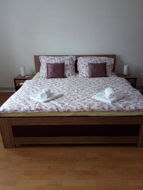 Postel nebo postele na pokoji v ubytování Apartman JulRich