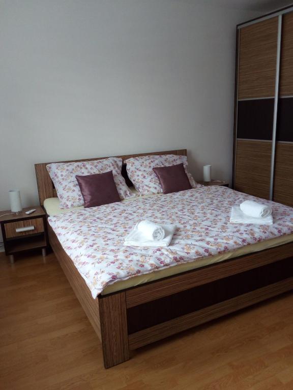 Postel nebo postele na pokoji v ubytování Apartman JulRich