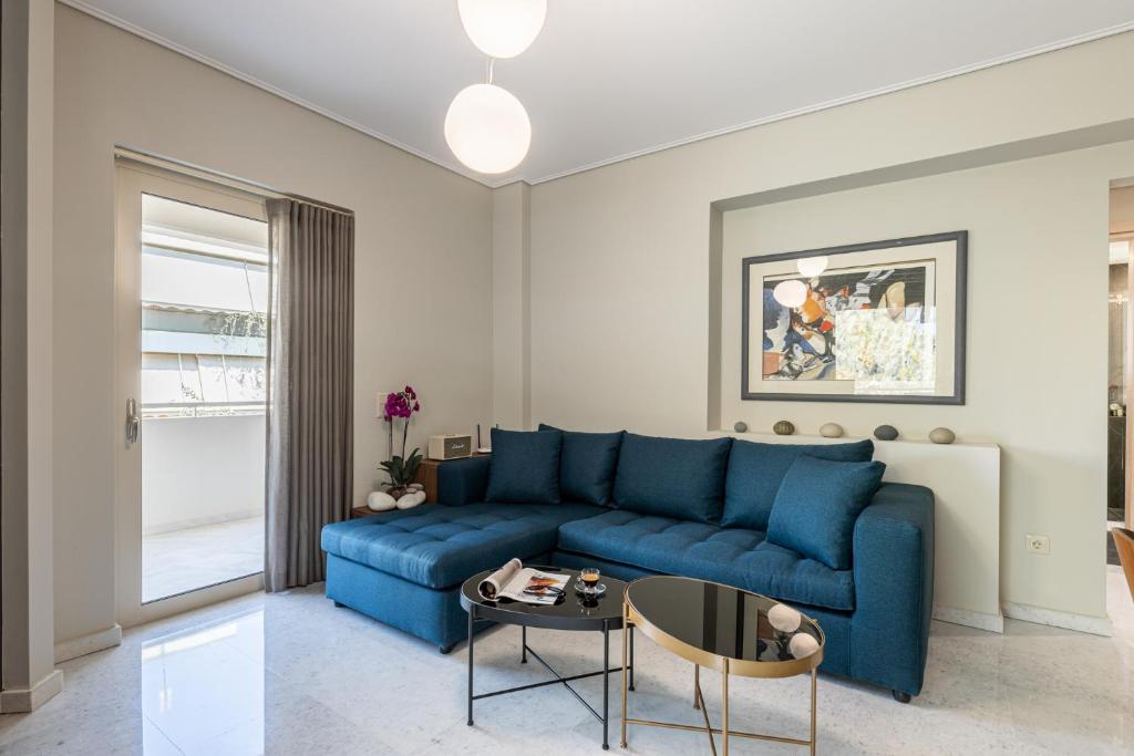 A seating area at Olygreen Athens Residences