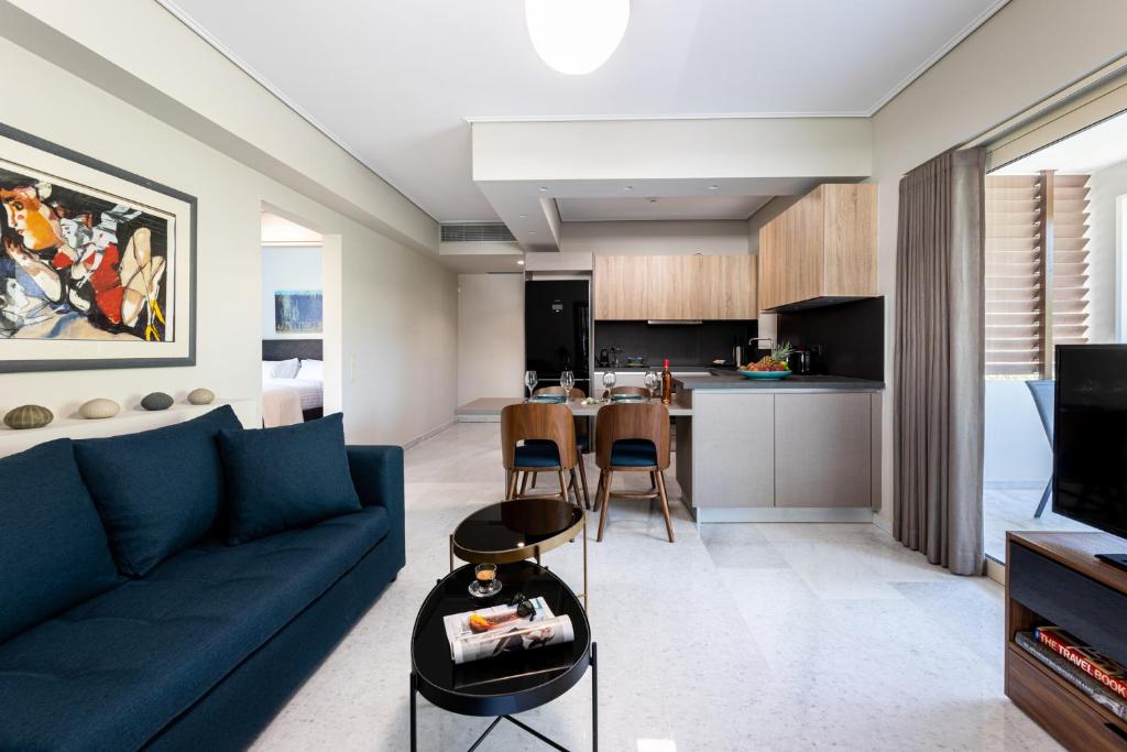 A kitchen or kitchenette at Olygreen Athens Residences