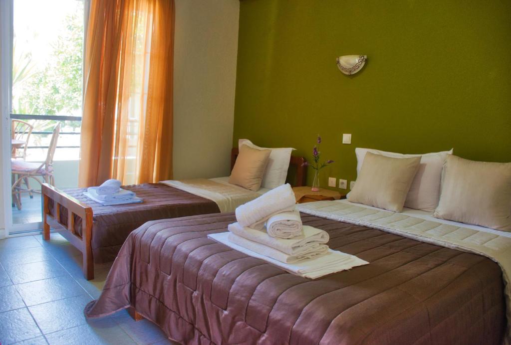 Postel nebo postele na pokoji v ubytování Hotel Barracuda