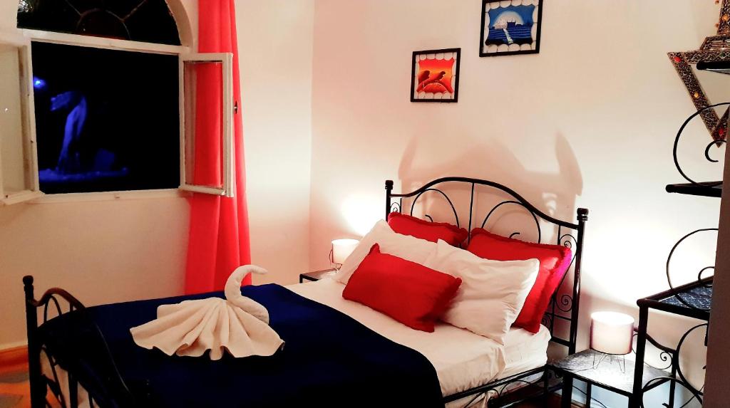 Postel nebo postele na pokoji v ubytování Camping & Hôtel Le Calme