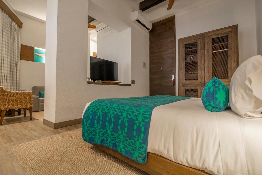 Postel nebo postele na pokoji v ubytování Sophia Hotel