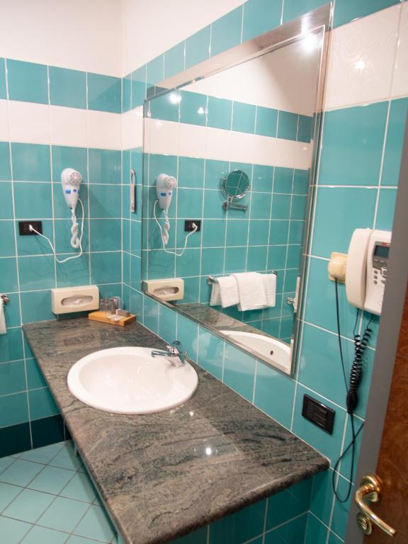 Kúpeľňa v ubytovaní Hotel Tessarin