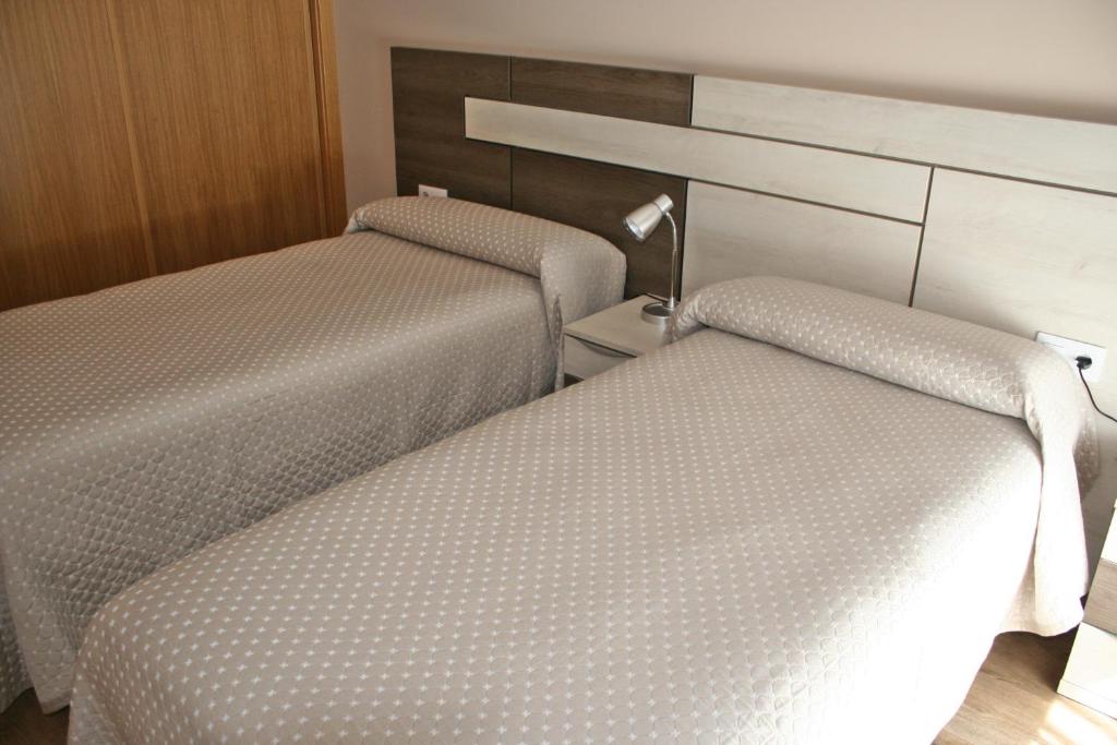 Cama o camas de una habitación en Los Casares
