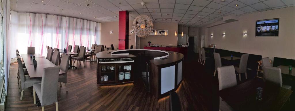 TV a/nebo společenská místnost v ubytování Hotel Pankow