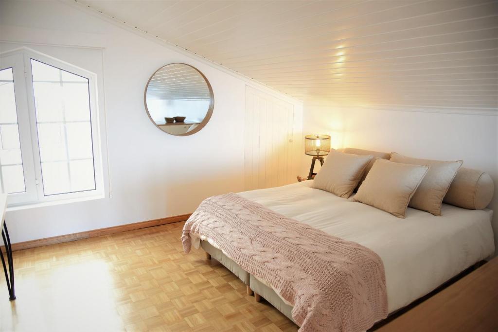 Postel nebo postele na pokoji v ubytování 374 CK Seaside Guest House