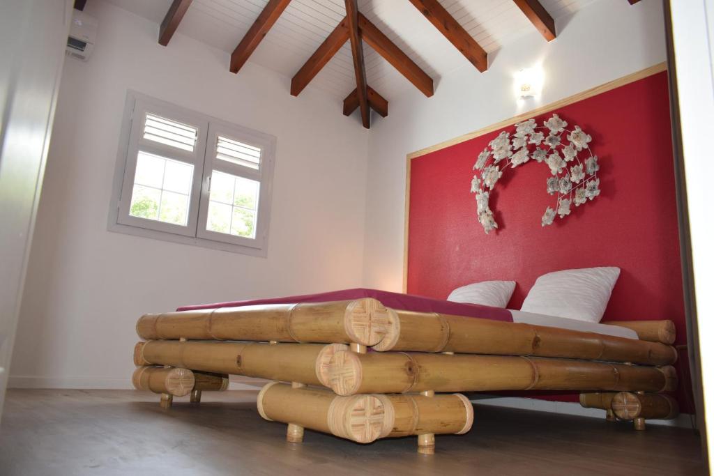 Postel nebo postele na pokoji v ubytování MAISON TI BAMBOU