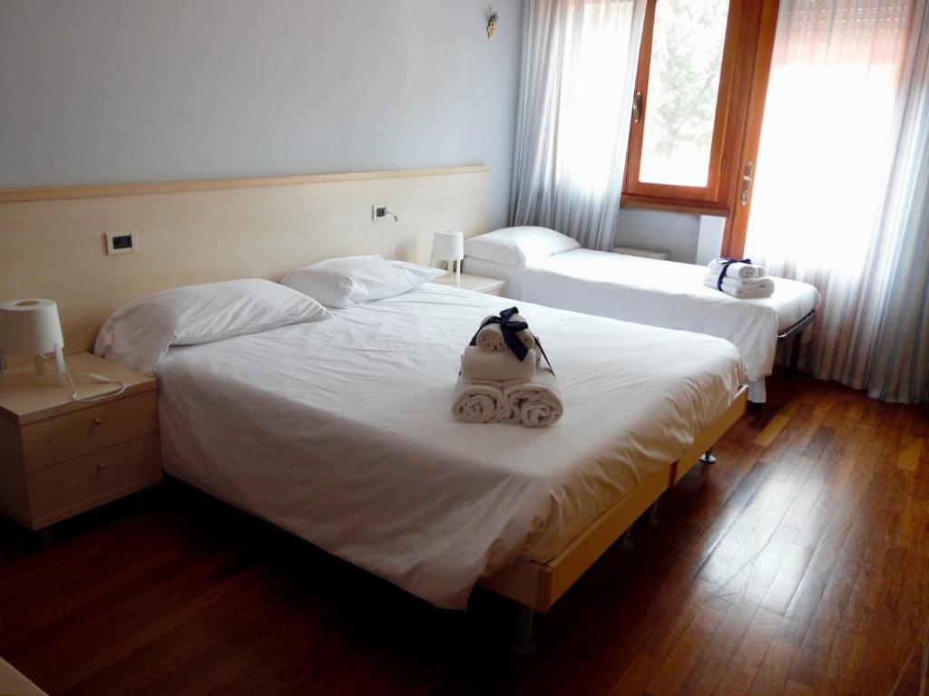 Postel nebo postele na pokoji v ubytování Al Borgo
