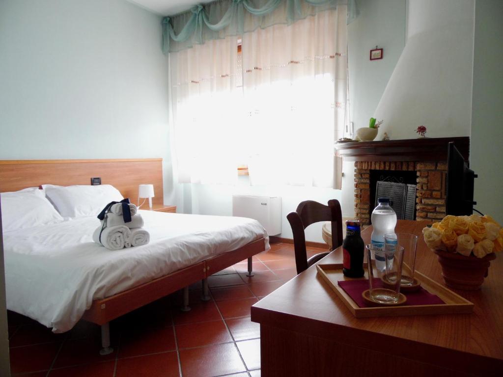 Postel nebo postele na pokoji v ubytování Al Borgo