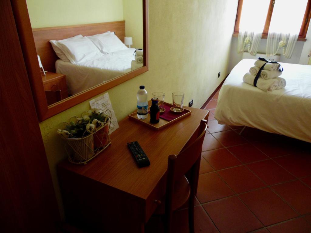 Postel nebo postele na pokoji v ubytování Al Borgo