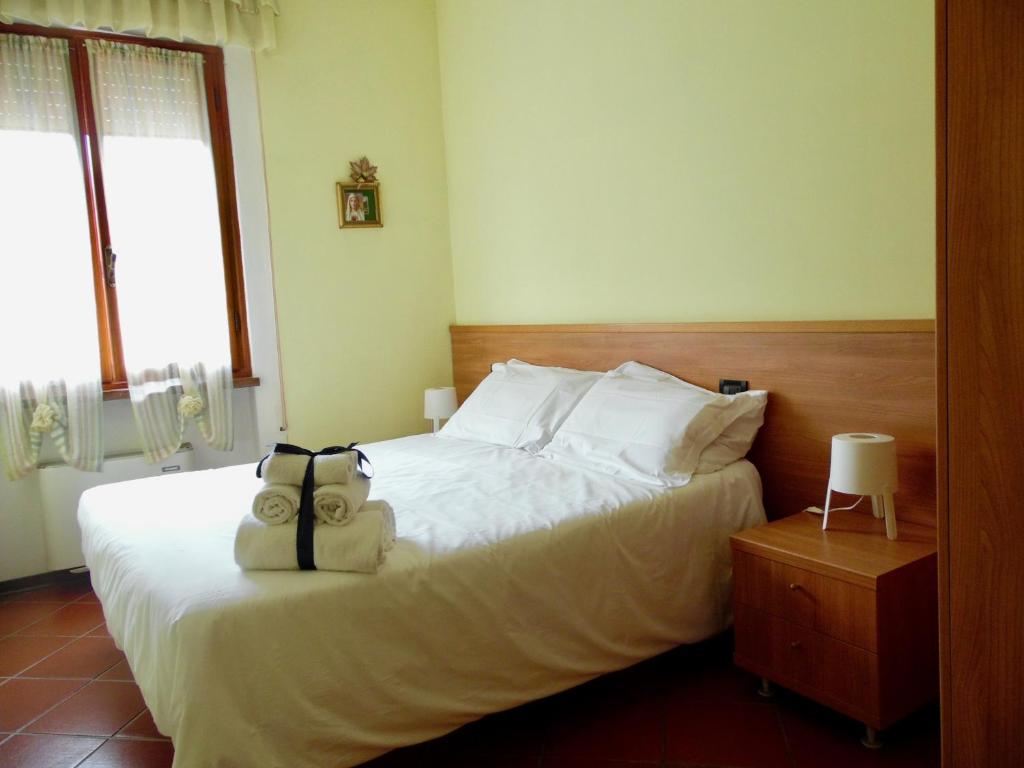 Postel nebo postele na pokoji v ubytování Al Borgo