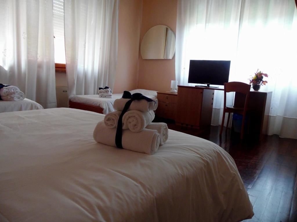 Postel nebo postele na pokoji v ubytování Al Borgo