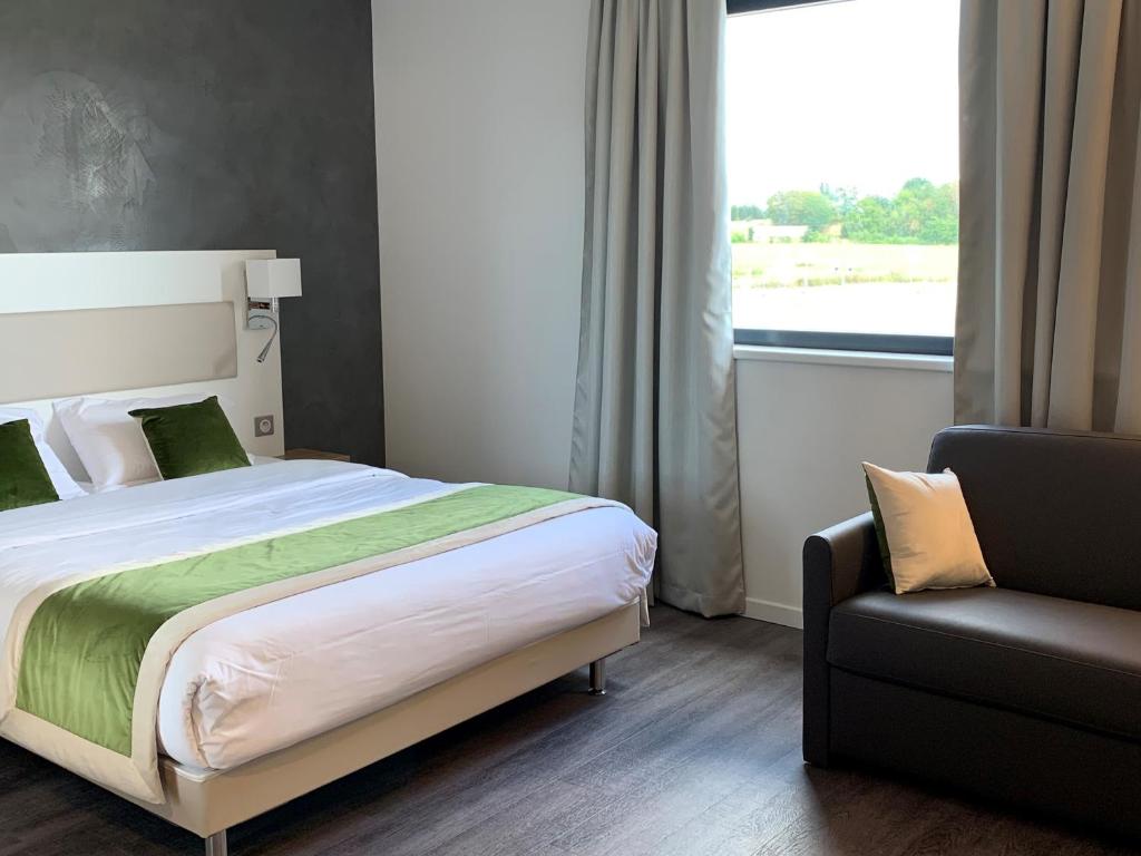 Postel nebo postele na pokoji v ubytování ATOLON PARK HOTEL