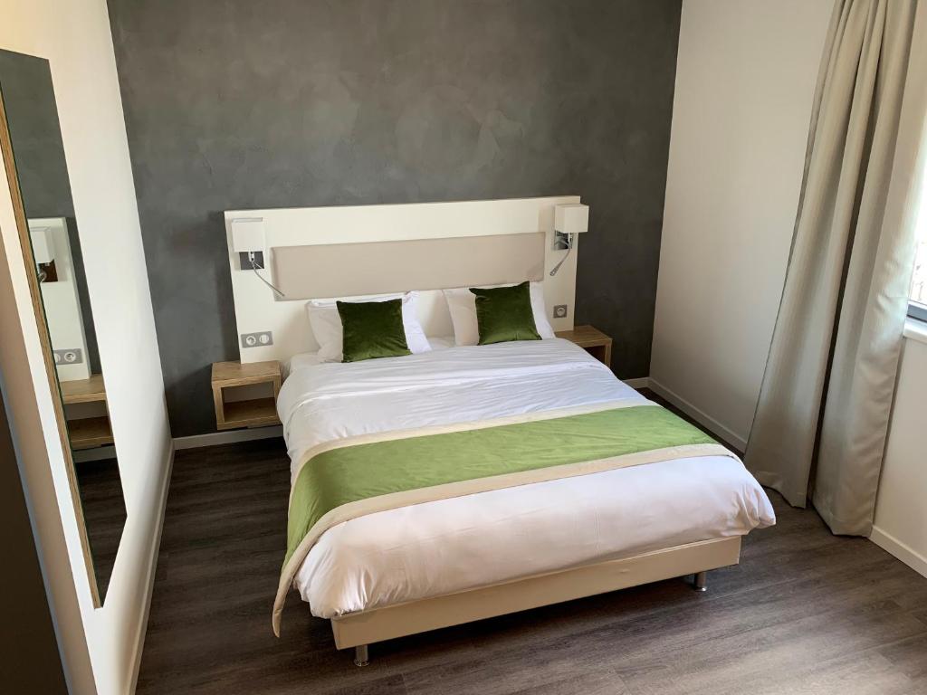 Postel nebo postele na pokoji v ubytování ATOLON PARK HOTEL