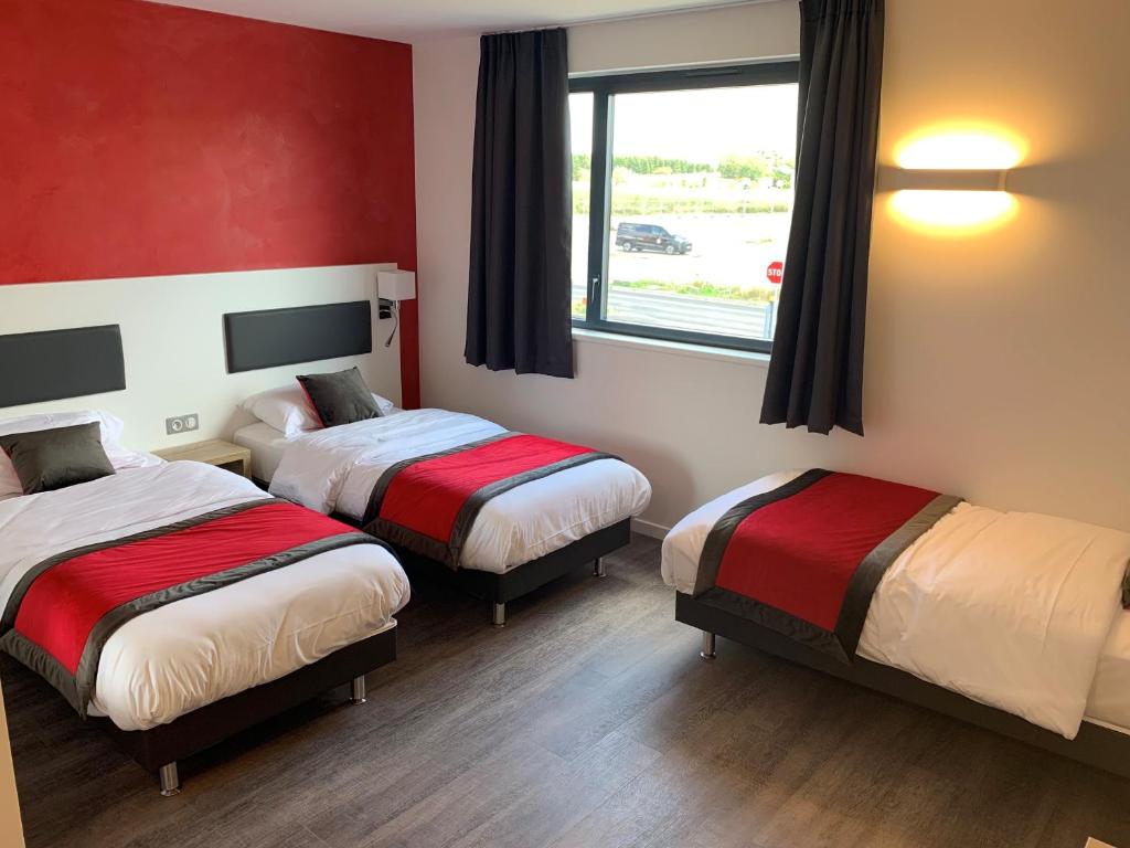 Postel nebo postele na pokoji v ubytování ATOLON PARK HOTEL